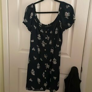 A blue button up dress from Abercrombie with flowers on it